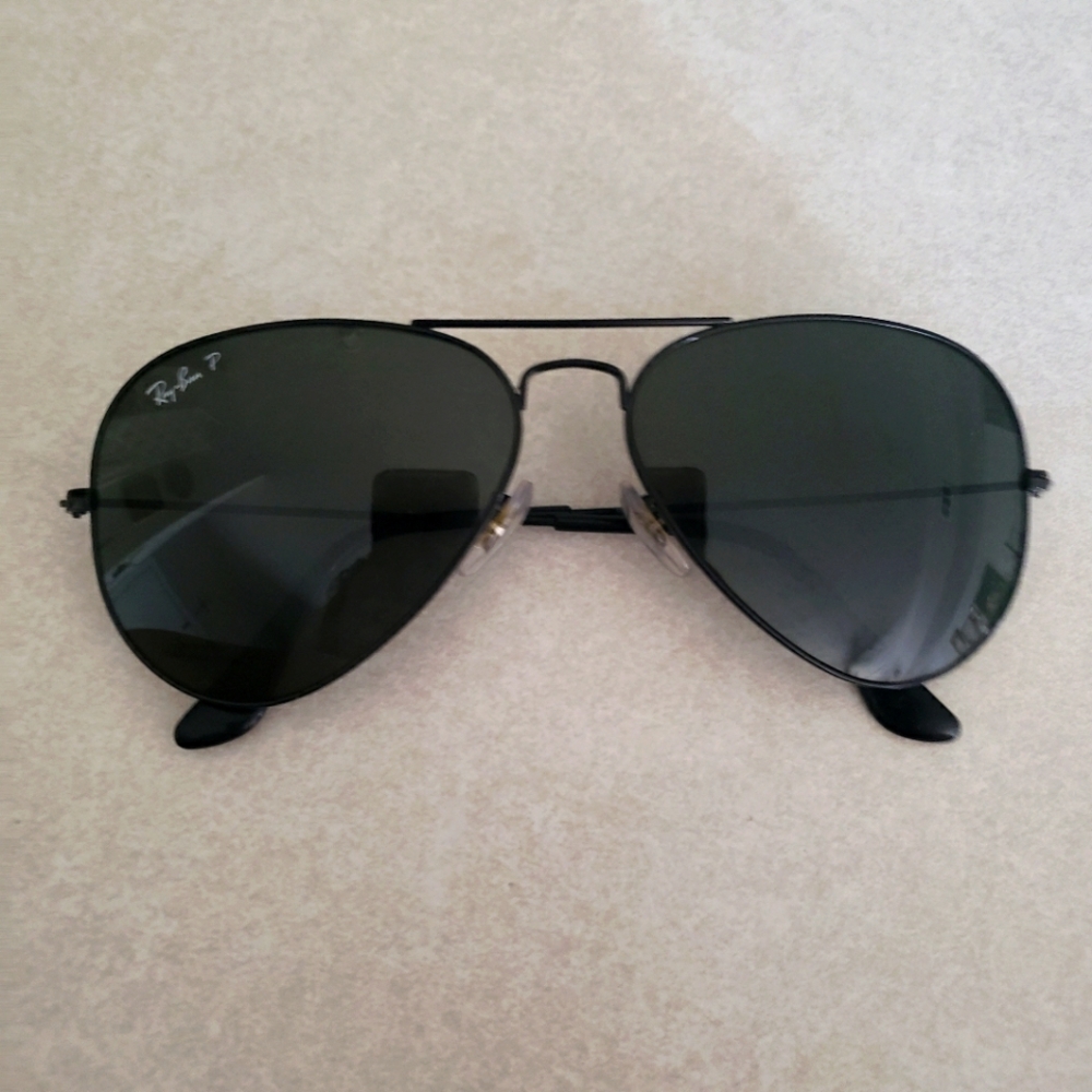 Ray-Ban Sunglasses, Black polarized aviator.